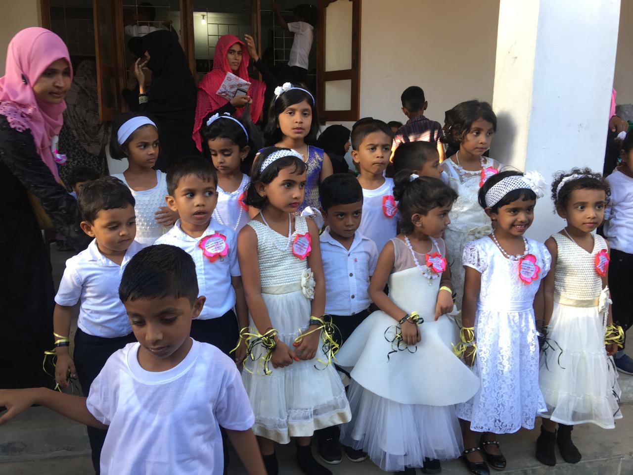 Children taking part in a school-community celebration at Pottuvil Osmaniya school.